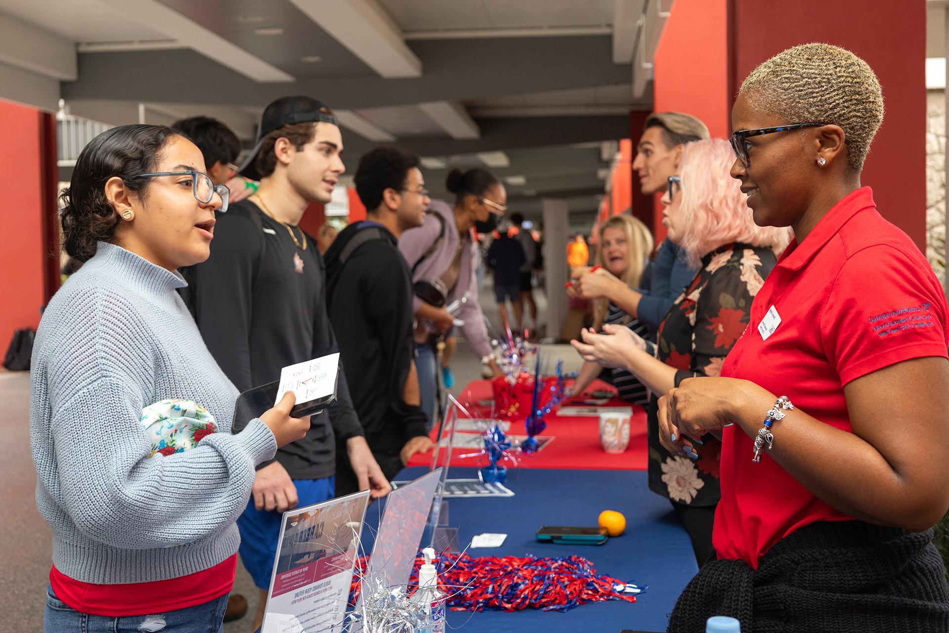 Reaching out to students on a crowded Breezeway